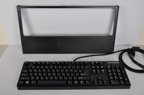 The removable palm rest literally just rests on main keyboard.
